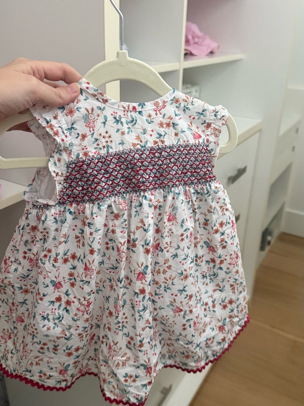 Doña Carmen Floral Smocked Baby Dress in White with Pink Accents
